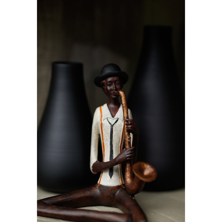 Sitting Jazz Band Saxophonist - Reposing
